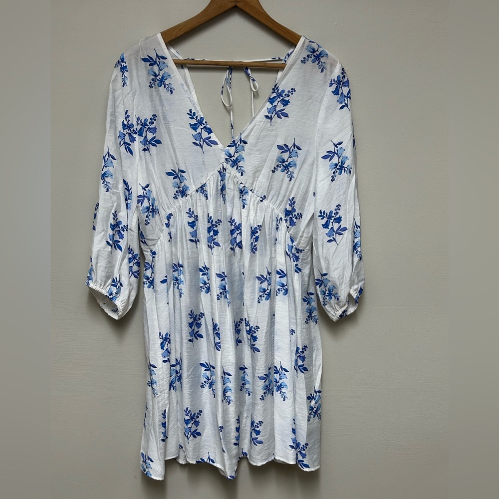 H&M Floral blue and white dress or cover up never worn size small